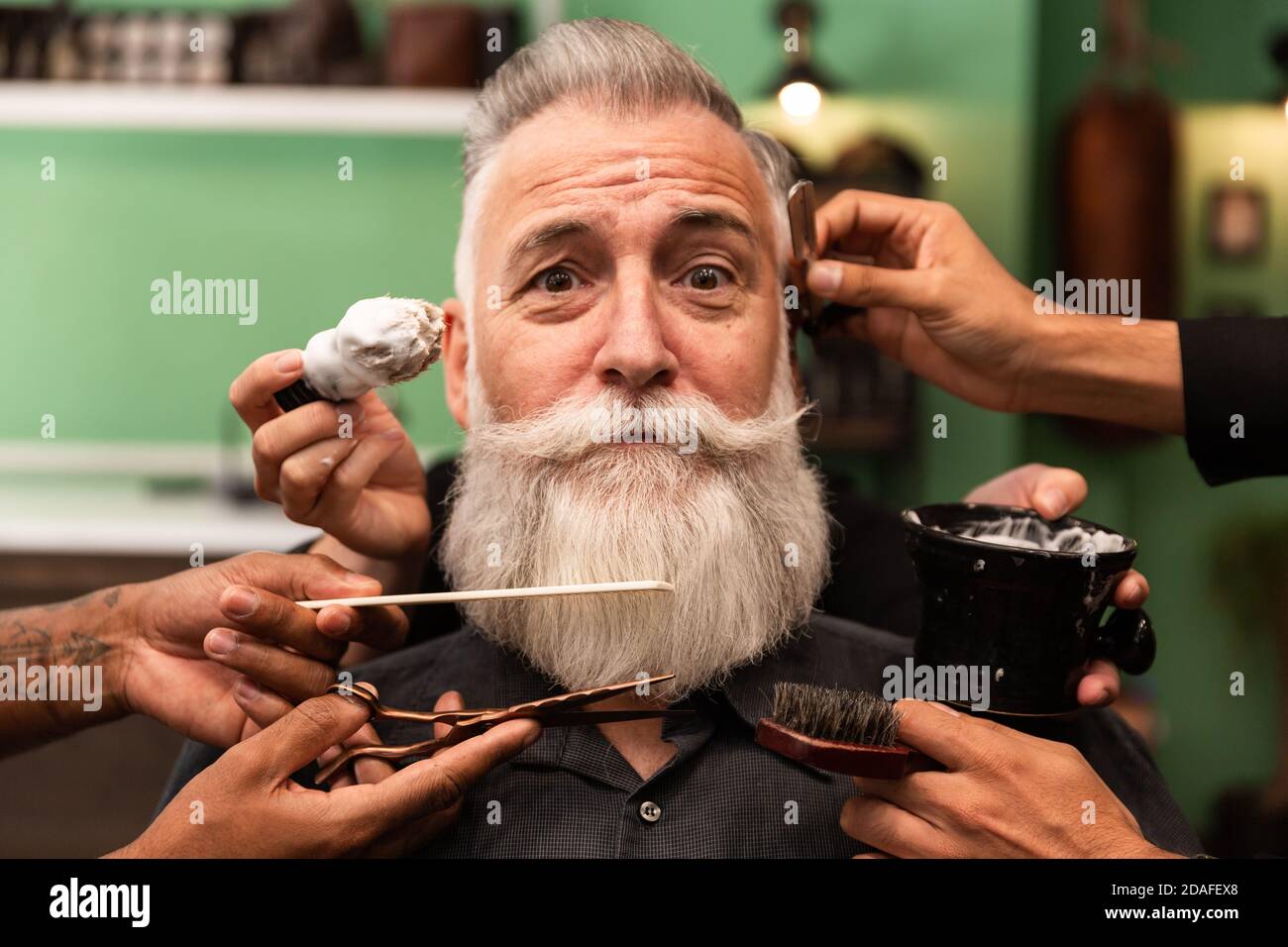 concept of an older man with a white beard is shaved