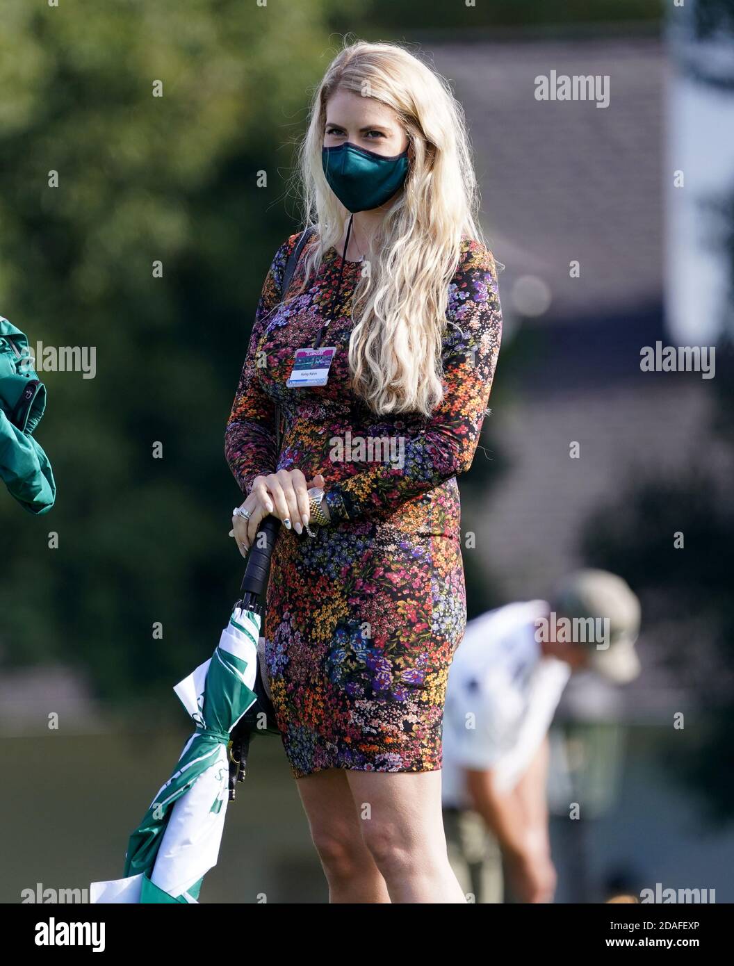 Augusta, United States. 12th Nov, 2020. Kelley Cahill watches Jon Rahm of Spain hit from the 10th tee box in the first round of the 2020 Masters golf tournament at Augusta National Golf Club in Augusta, Georgia on Thursday, November 12, 2020. Photo by Kevin Dietsch/UPI Credit: UPI/Alamy Live News Stock Photo