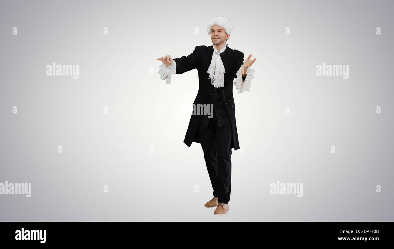 18th cent music director conducting with inspiration on gradient Stock Photo