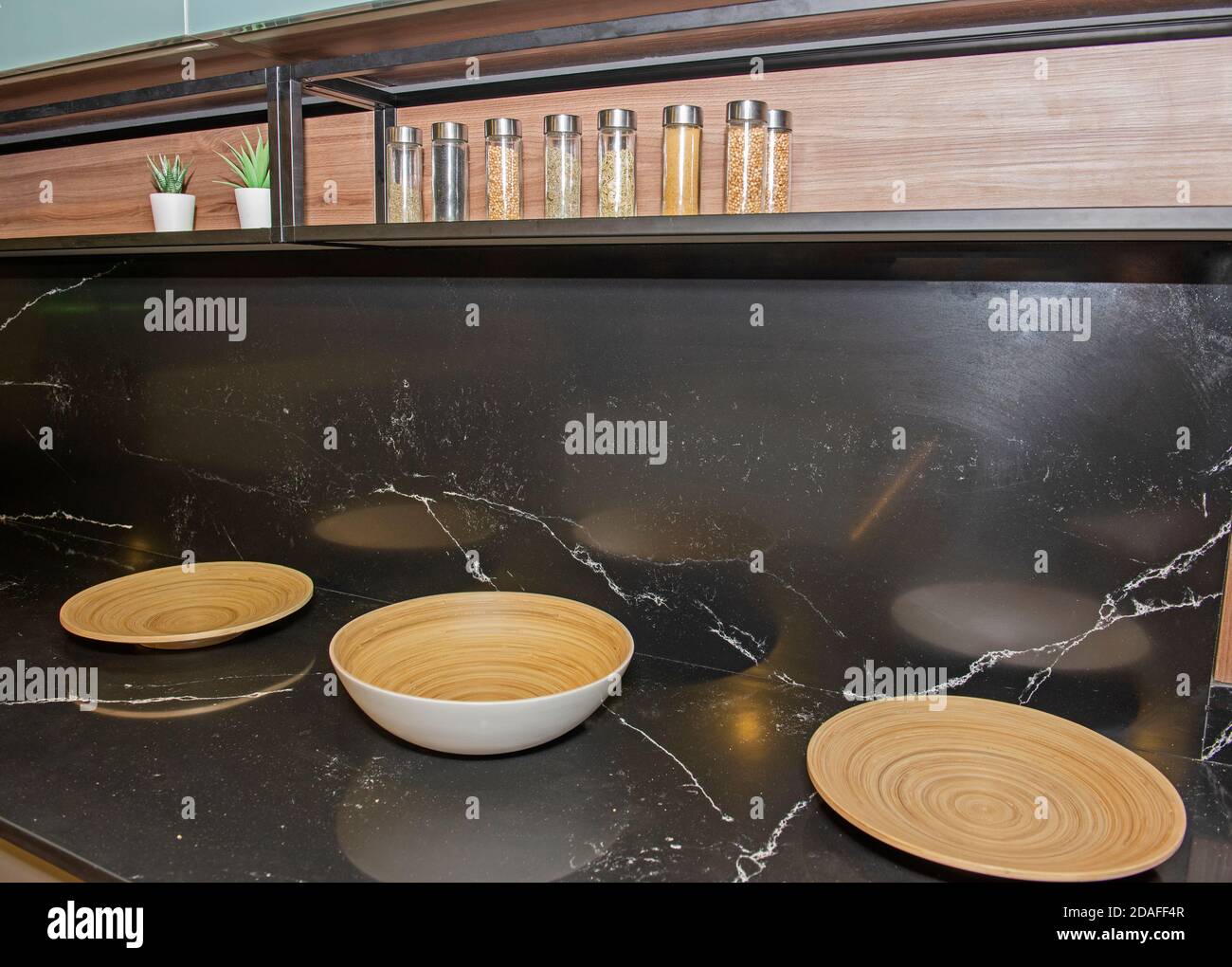 Picture of Interior design of modern domestic kitchen counter with wooden bowls ...