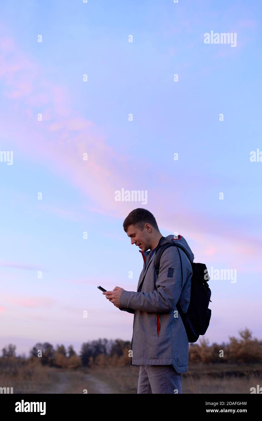 Young man with smartphone Stock Photo