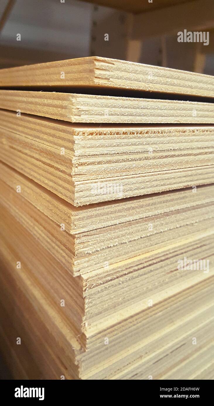 Sheets of stacked plywood in the warehouse Stock Photo Alamy