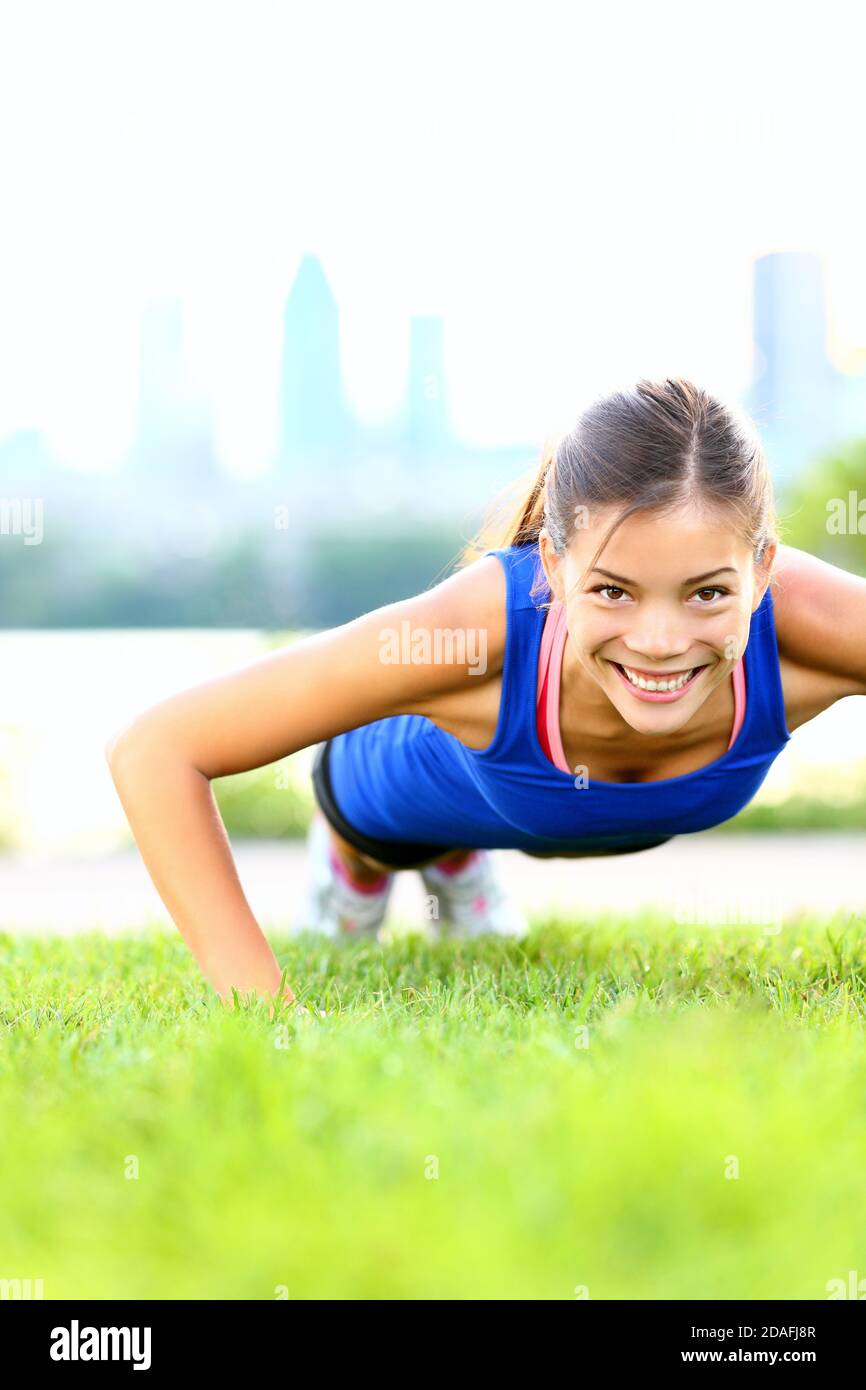 Exercise woman push ups workout Stock Photo Alamy