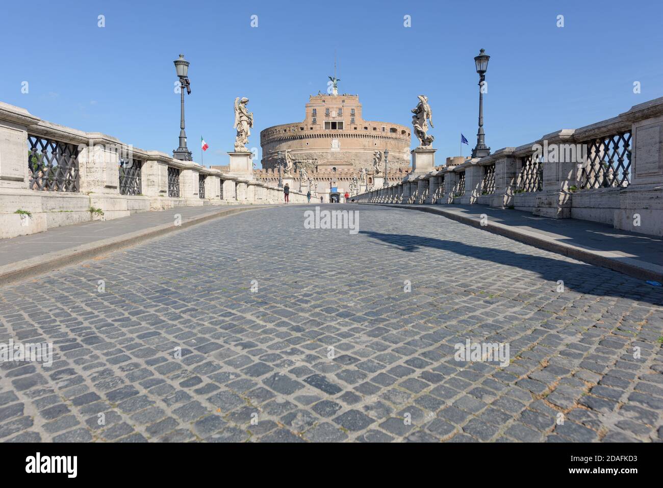 Rome, Italy - 12 March 2020:  the popular tourist spot of the Sant Angelo bridge is now deserted, a rare sight in Rome, Italy. Today, the Italian gove Stock Photo