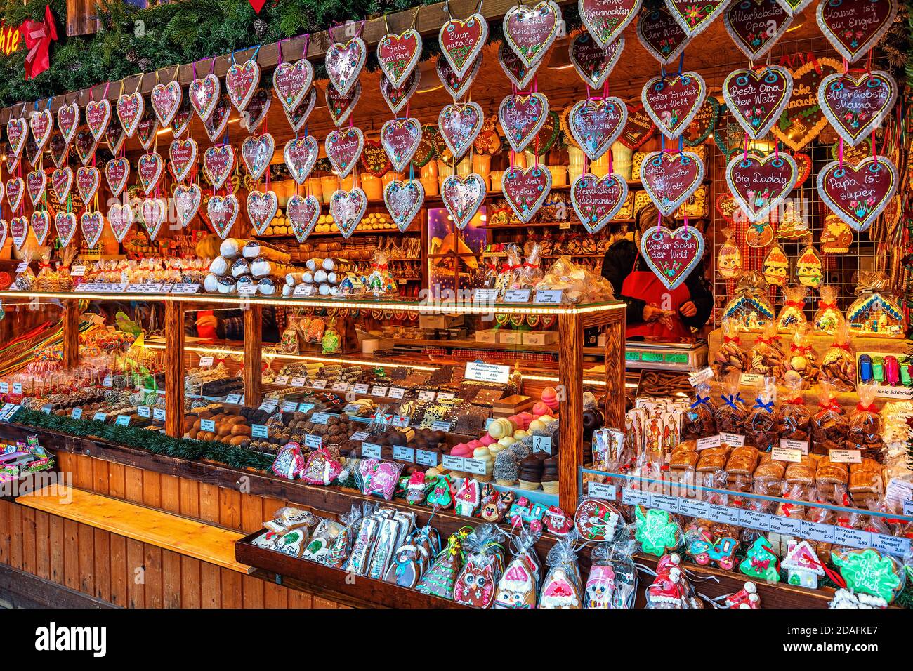 Heart-shaped gingerbread cookies, traditional sweets and candies at famous Christmas market in Vienna, Austria. Stock Photo