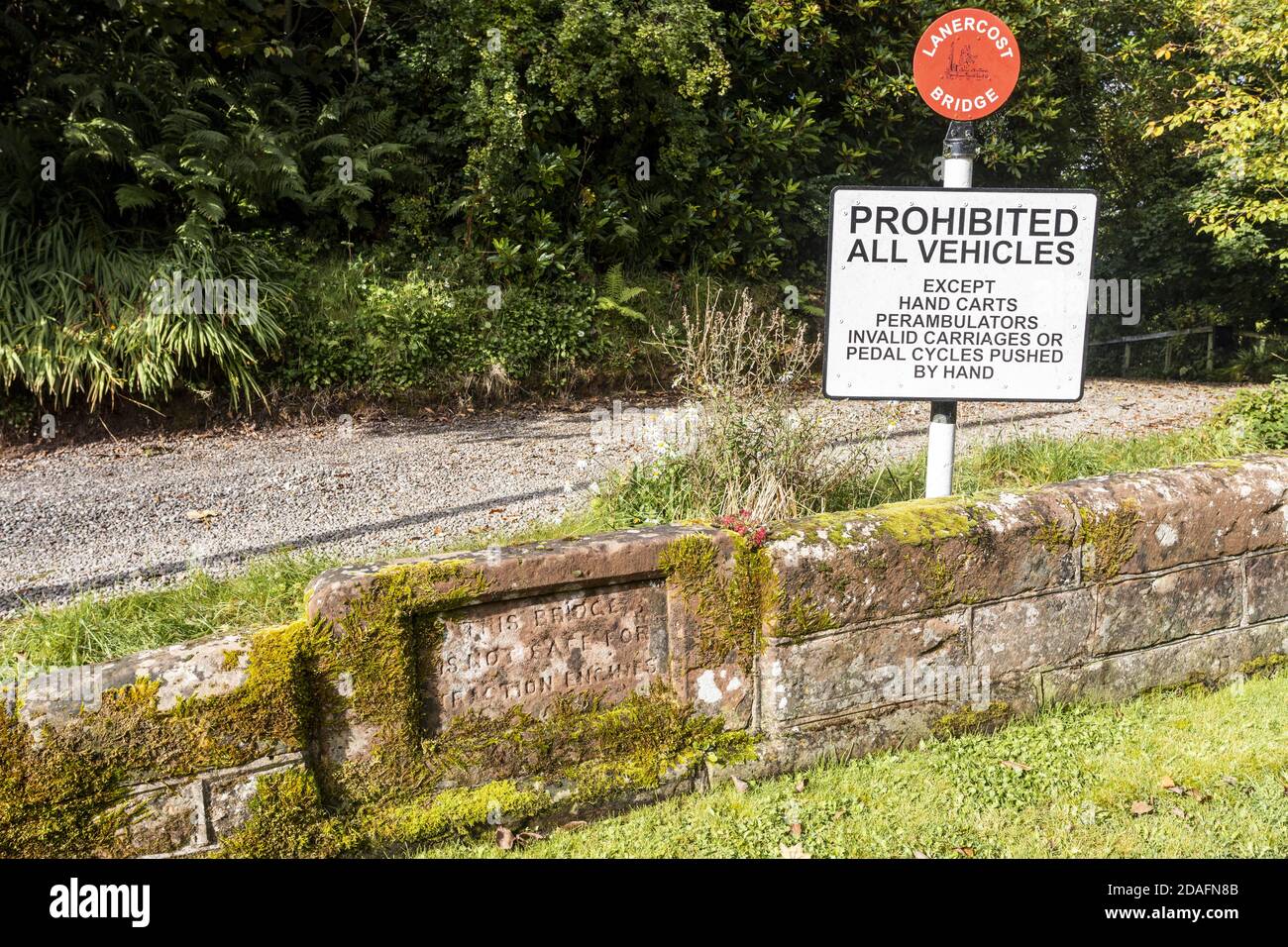 Traffic prohibition notice (including Not Safe For Traction Engines) on Old Lanercost Bridge built of red sandstone over the River Irthing in 1724 Stock Photo