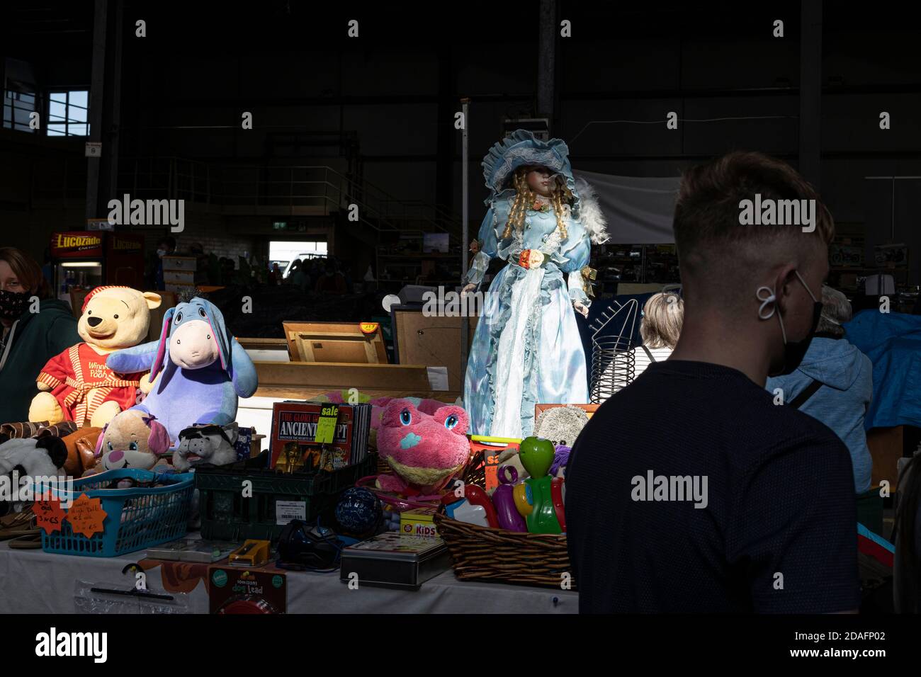 Light and shade on dolls, cuddley toys, winnie the pooh, at Car boot sale, bric a brac, for sale at a weekly market at Castleinch, County Kilkenny, Ir Stock Photo