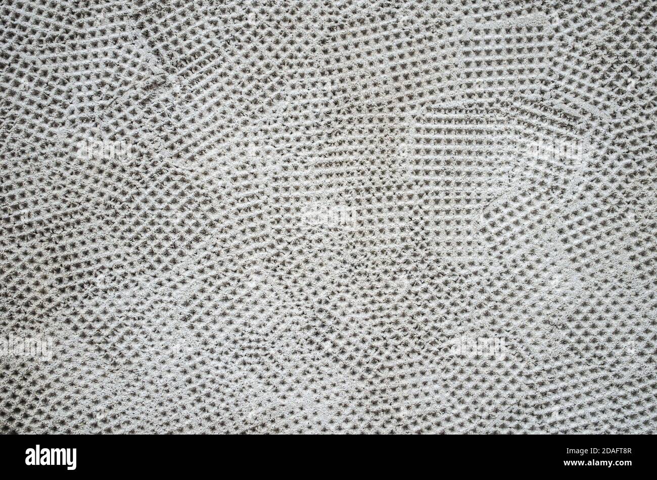 Gray plaster with artistic texture. Concrete loft texture photo. Stock Photo