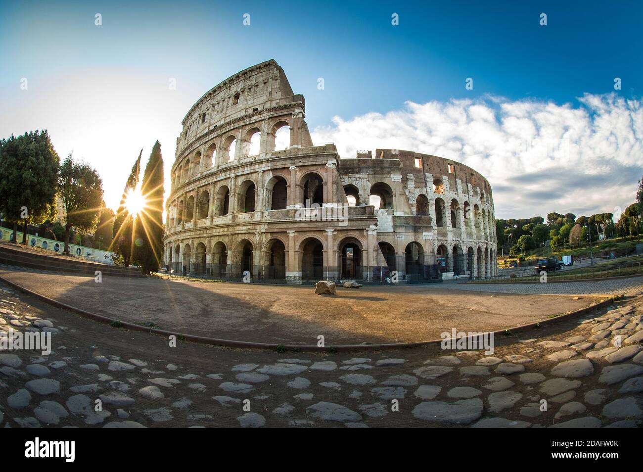The Colosseum or Coliseum at sunrise and roman stones, Rome Italy Stock