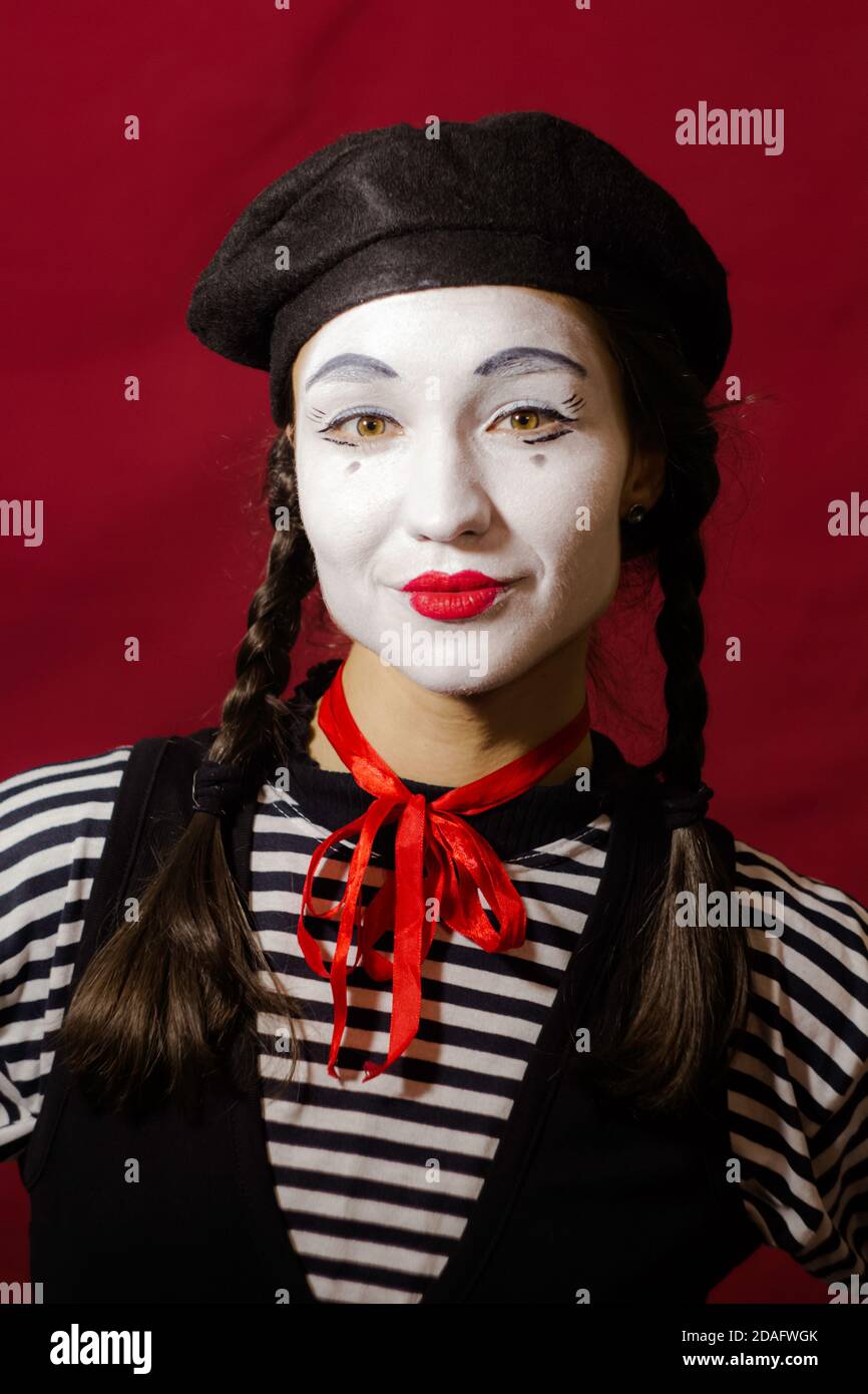 Beautiful mime girl smiling, looking at the camera Stock Photo - Alamy