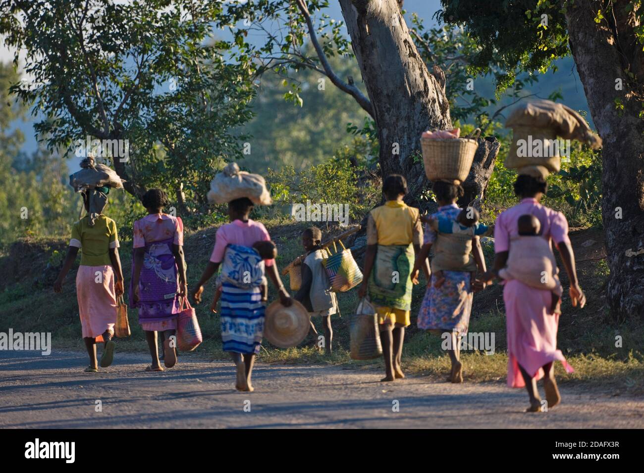 Woman carrying basket on head, Fort Dauphin, Madagascar Stock Photo