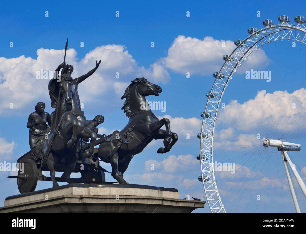 WESTMINSTER Statue Bodacia/ Boudica with spear and chariot and London Eye against blue sky