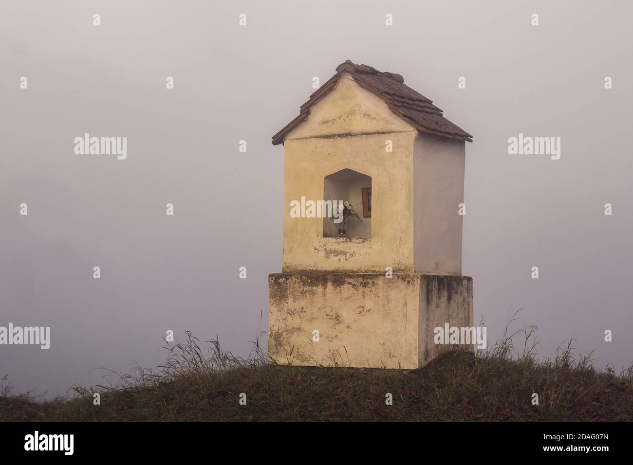 Alcove chapel in the fog, autumn foggy day Stock Photo