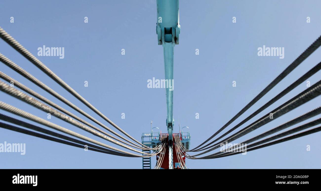 cables of port Industrial crane for lifting heavy containers Stock