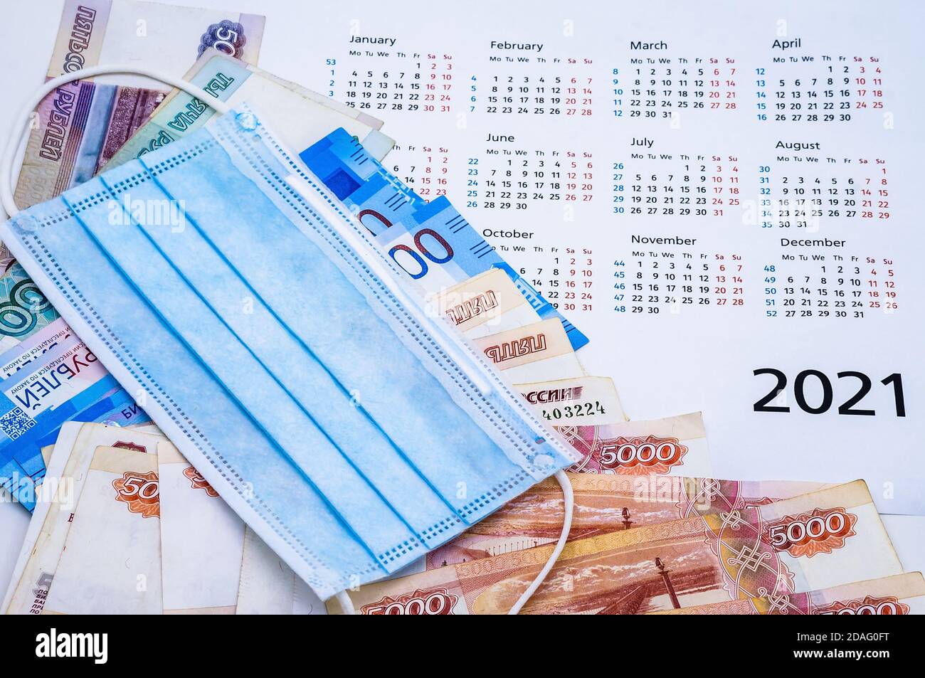 fabric mask and Russian money, medical mask and calendar 2021 