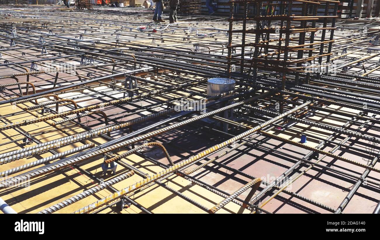 building grid foundation steel bars in construction site. Stock Photo
