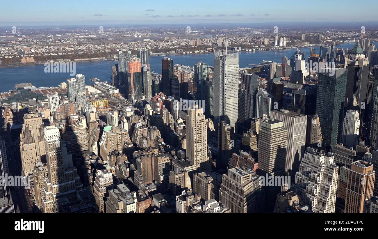 Manhattan buildings urban view skyscrapers and Hudson River, high angle view from skyscraper, New York City, USA. Stock Photo