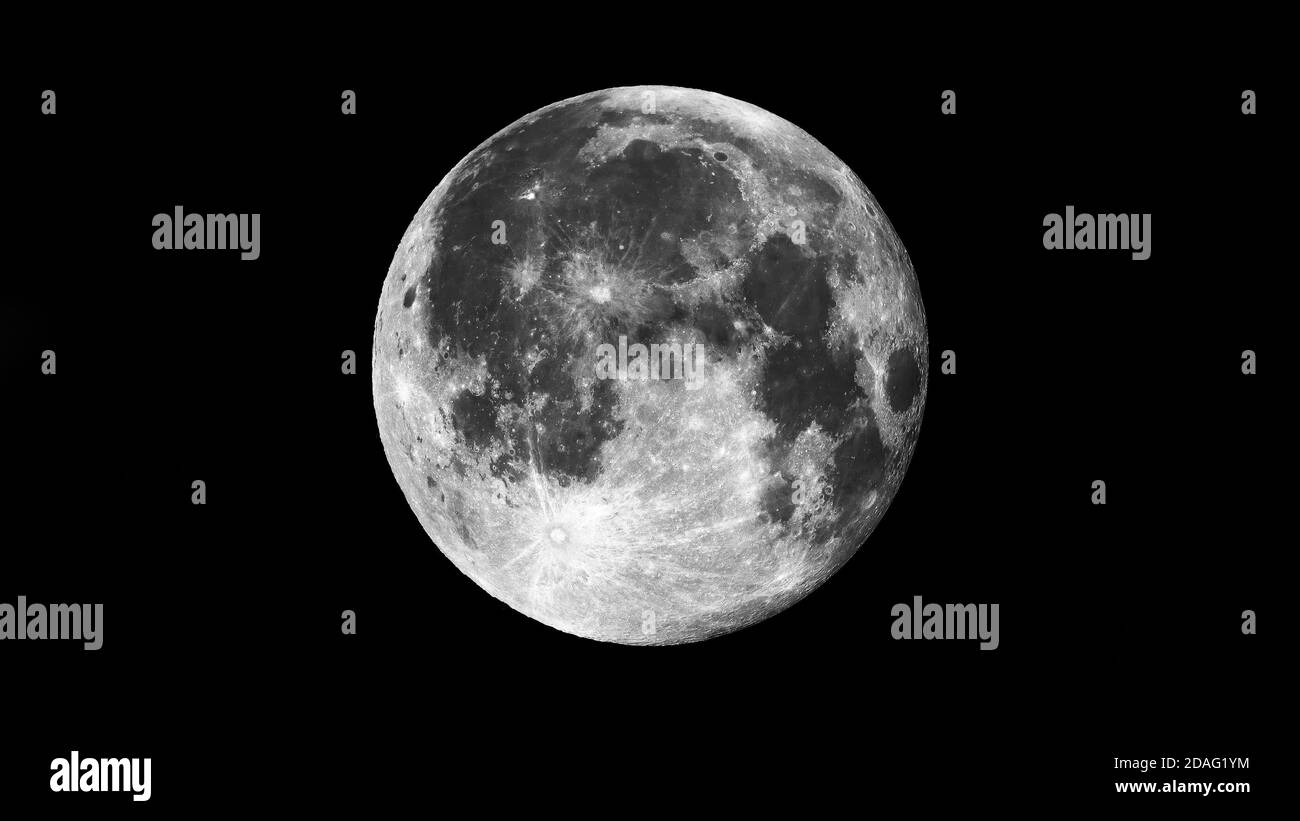full moon on black dark background in space Stock Photo - Alamy