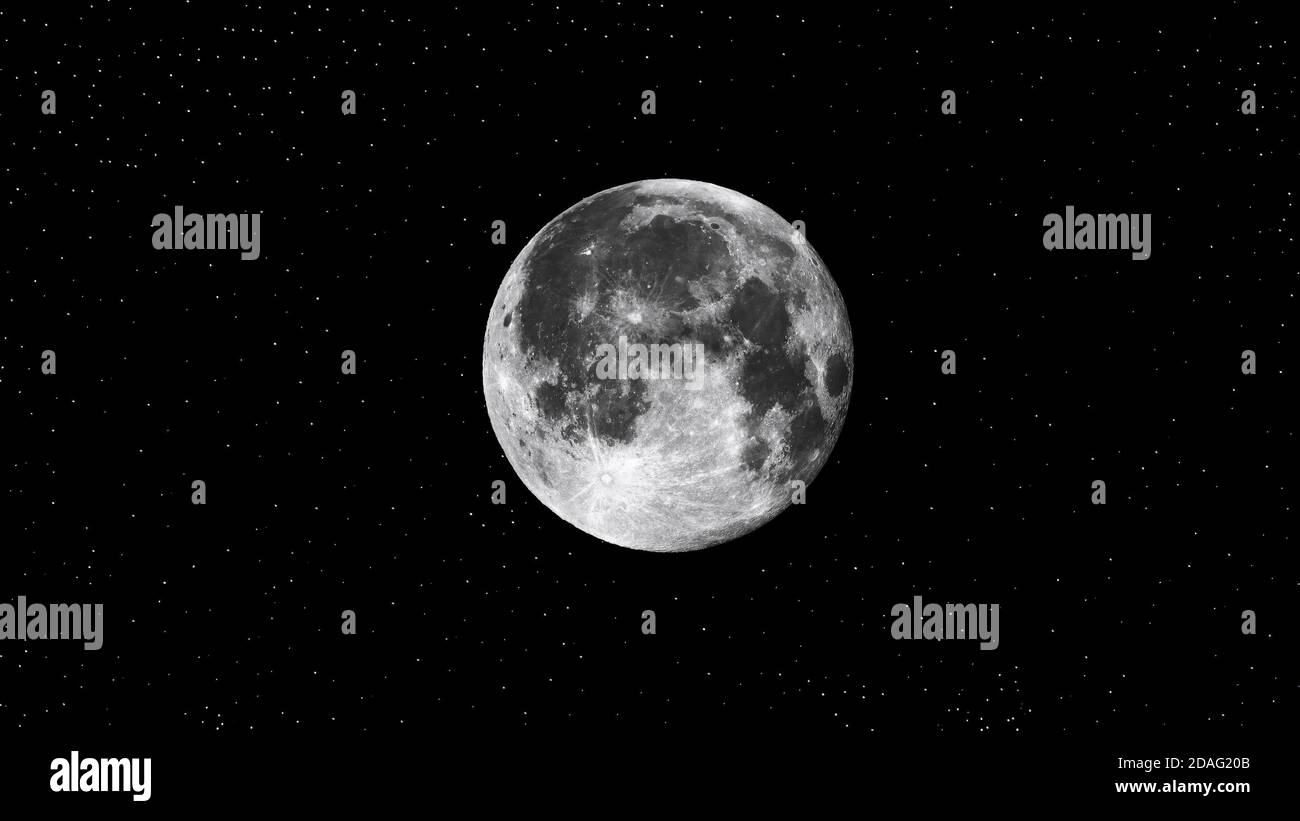 full moon on black dark background. Stock Photo
