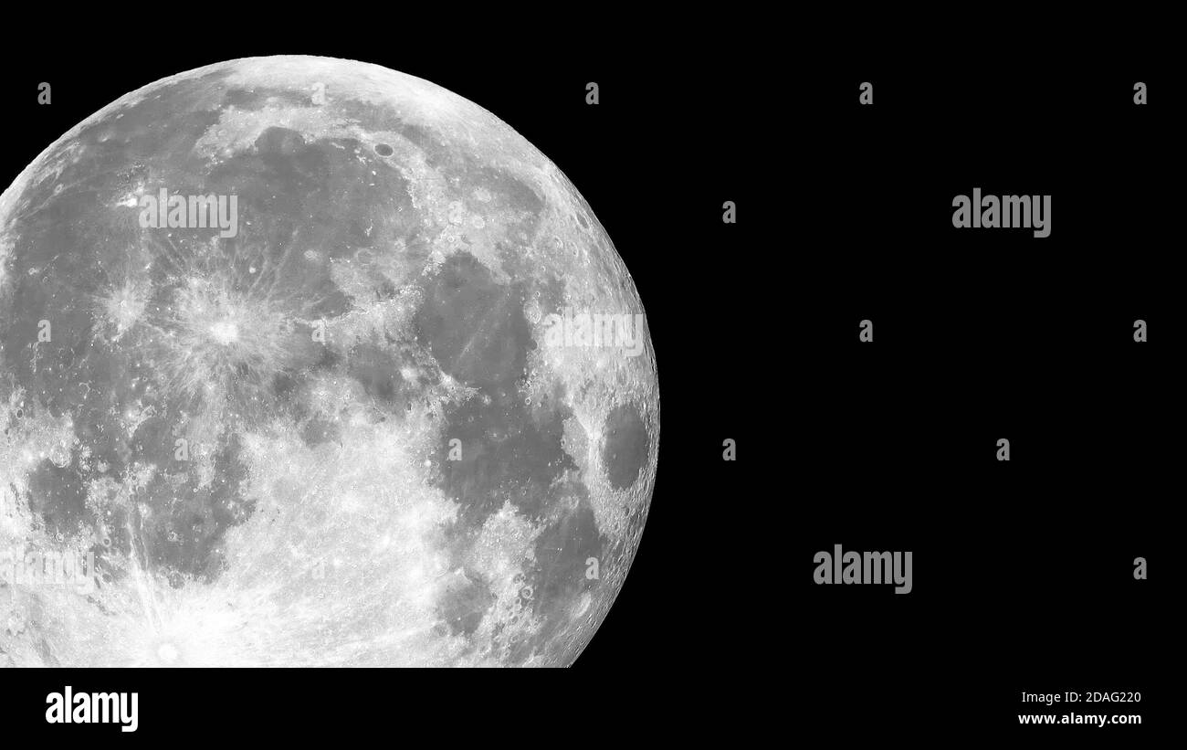 full moon on black dark background with copy space Stock Photo - Alamy
