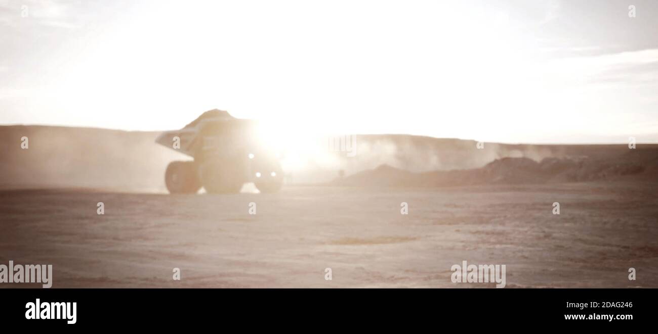 Haul truck in the quarry at sunrise or sunset background Stock Photo