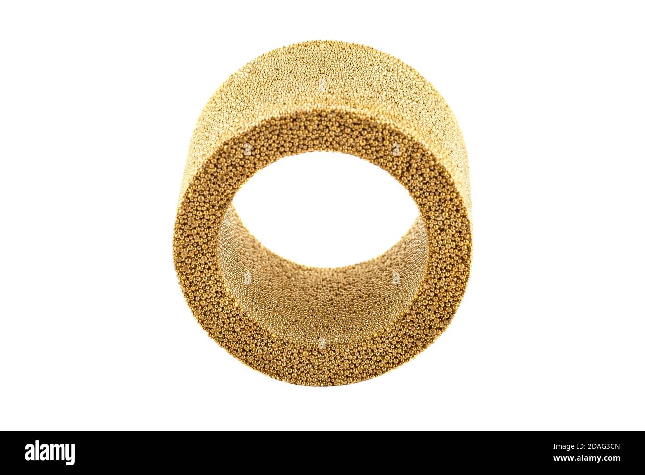 Macro shots of an air silencer element caked with brass balls, isolated