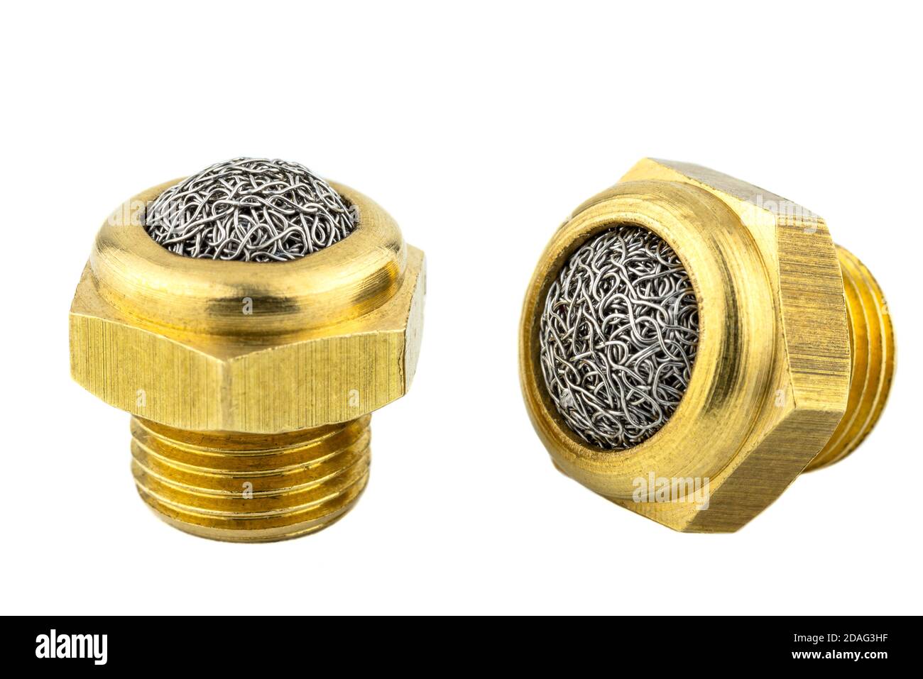 Macro shots of a brass air silencer with a metal mesh inside, isolated