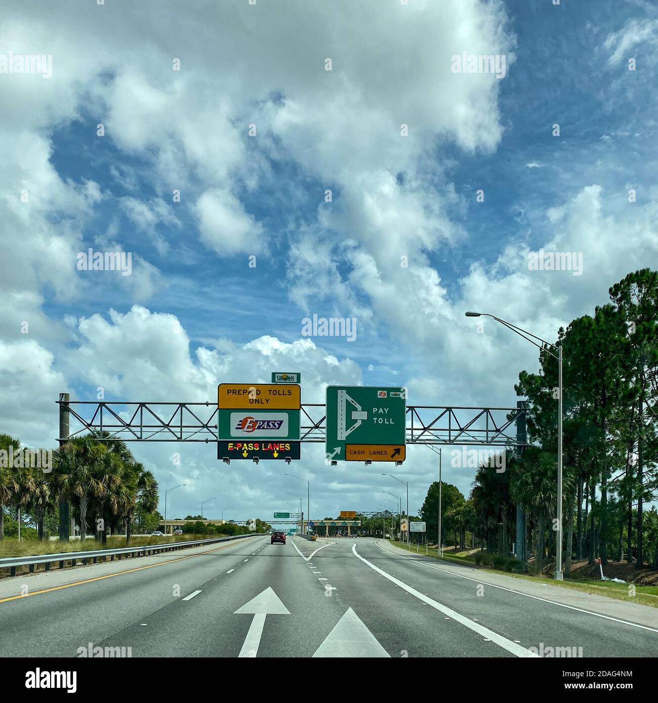 Orlando,FL/USA-10/6/19: A toll road sign that designates where people should drive to pay tolls for EPass and Sunpass in Orlando, Florida. Stock Photo