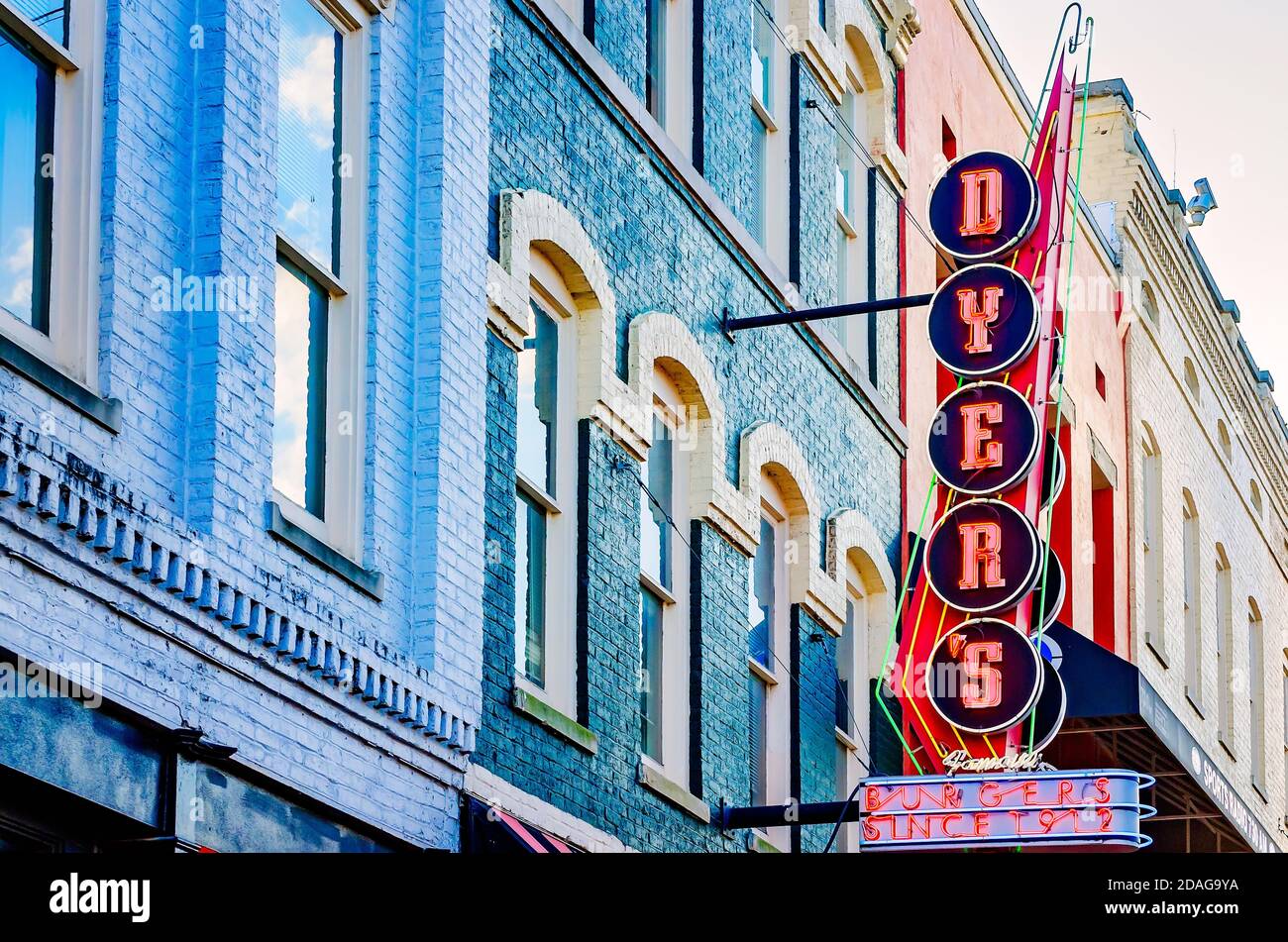 A neon sign hangs above Dyer’s Burgers on Beale Street, Sept. 12, 2015, in Memphis, Tennessee. Dyer’s opened in 1912. Stock Photo