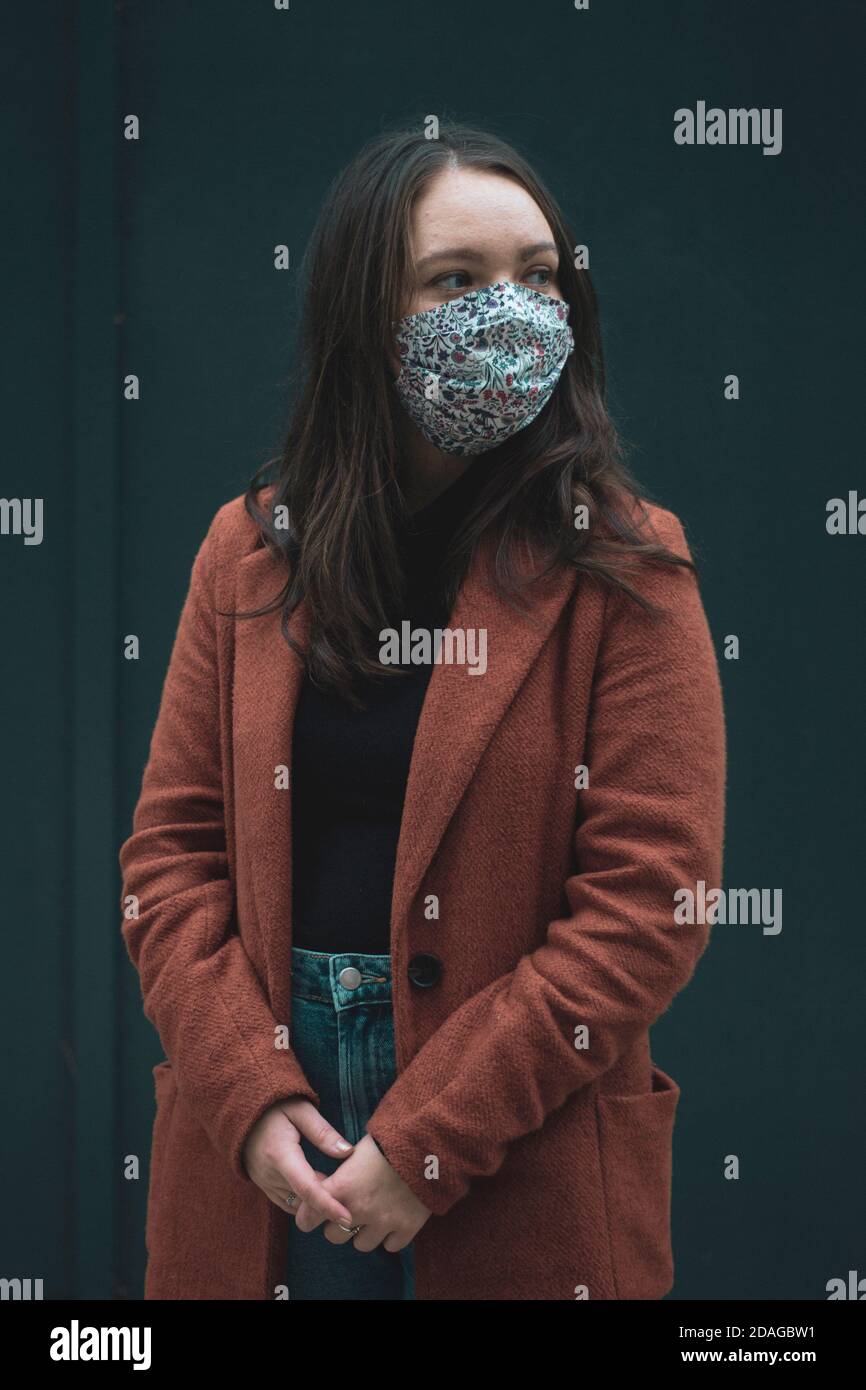 Person in orange coat hi-res stock photography and images - Alamy