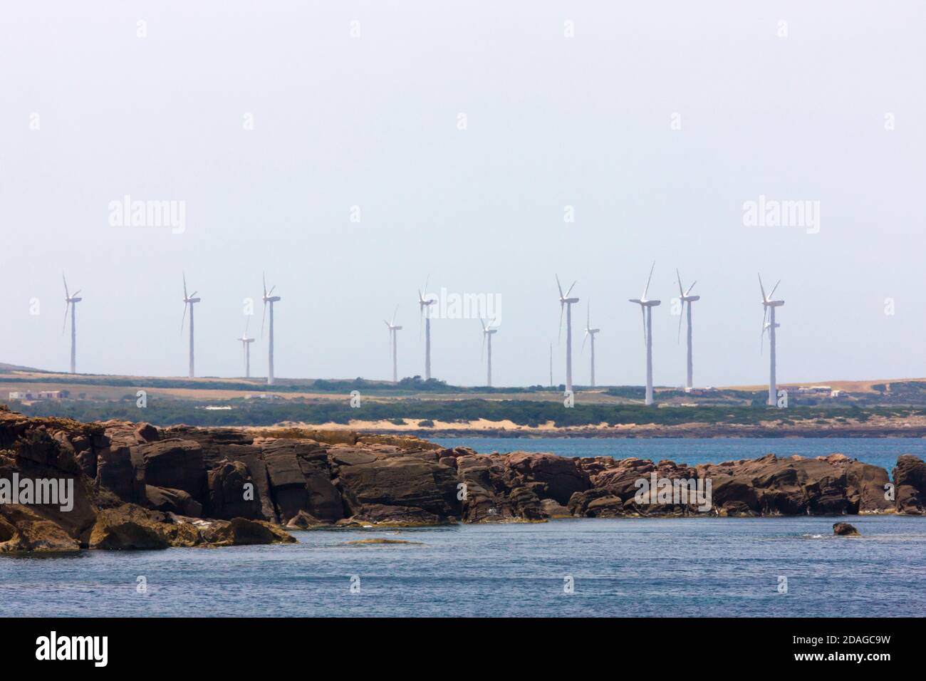 Wind turbines on the beach, Cap Bon, Tunisia Stock Photo
