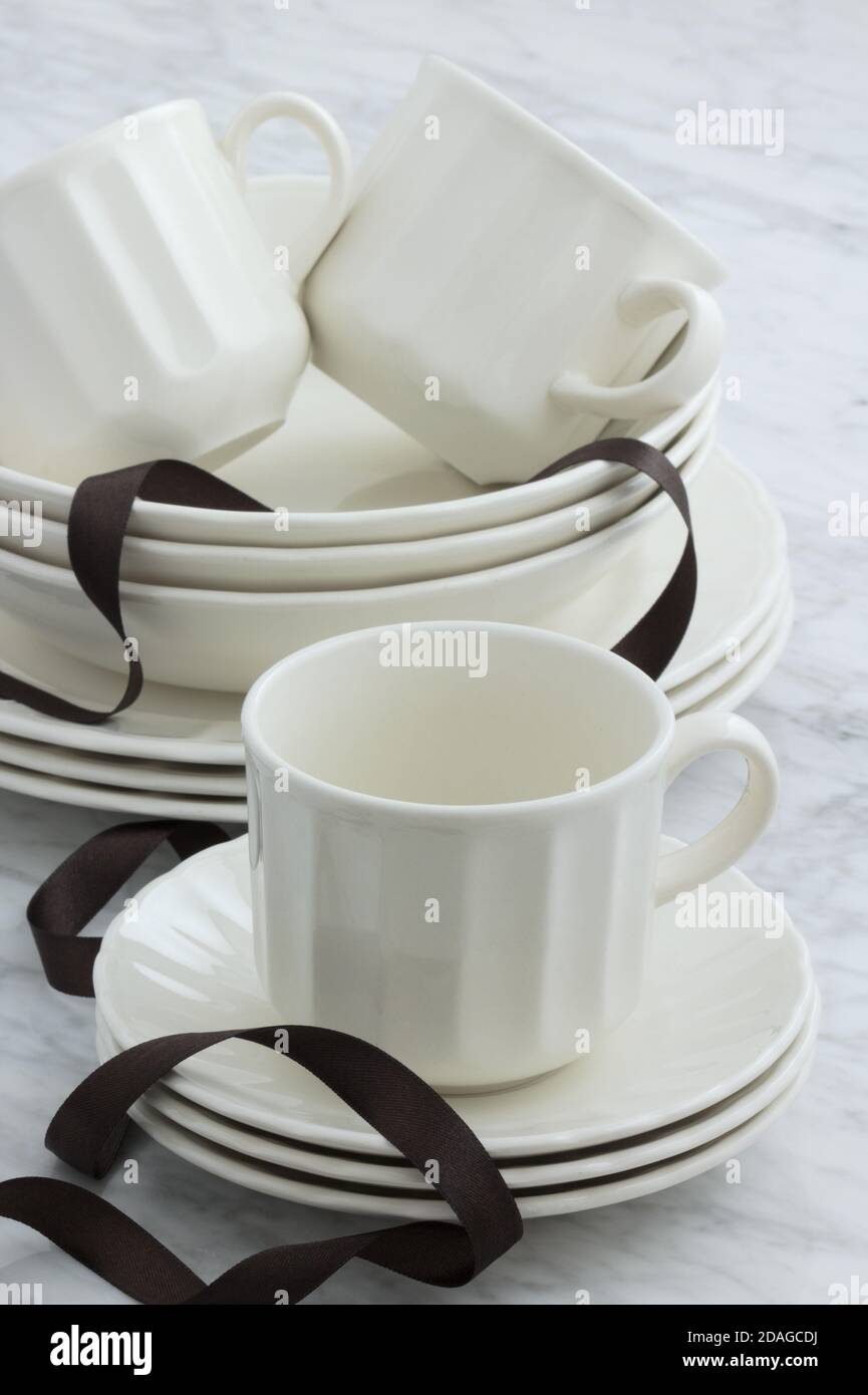 white porcelain dinnerware set with classic rimmed design perfect image