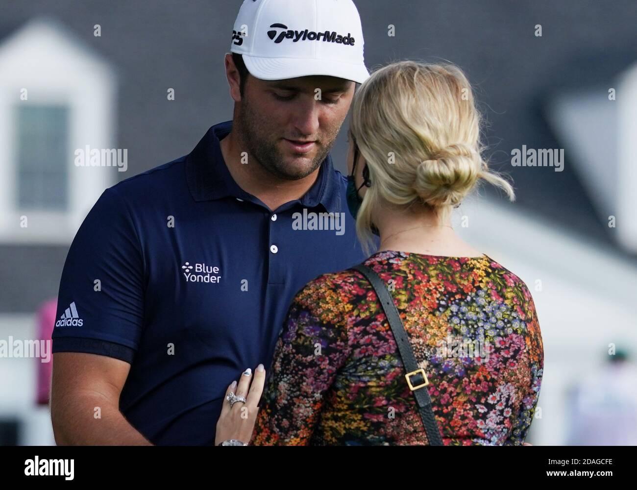 Augusta, United States. 12th Nov, 2020. Kelley Cahill greets Jon Rahm of Spain after his round in the first round of the 2020 Masters golf tournament at Augusta National Golf Club in Augusta, Georgia on Thursday, November 12, 2020. Photo by Kevin Dietsch/UPI Credit: UPI/Alamy Live News Stock Photo