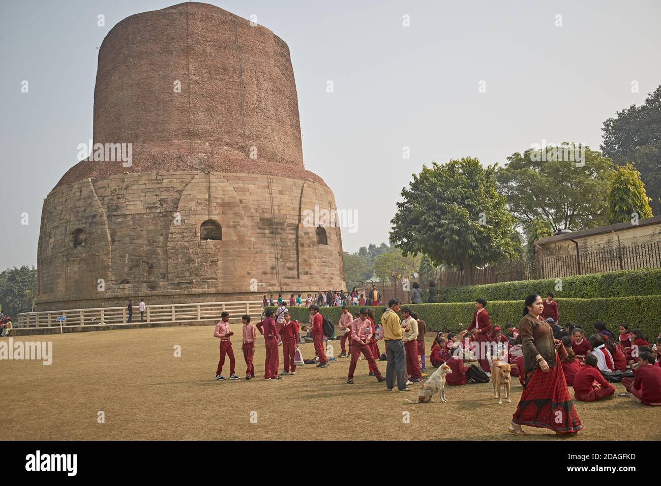 Varanasi, India, January 2016. A group of schoolchildren in front of Sarnath Stupa. Stock Photo