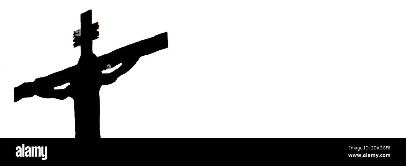 Silhouette of the crucified Jesus on a white background. Stock Photo