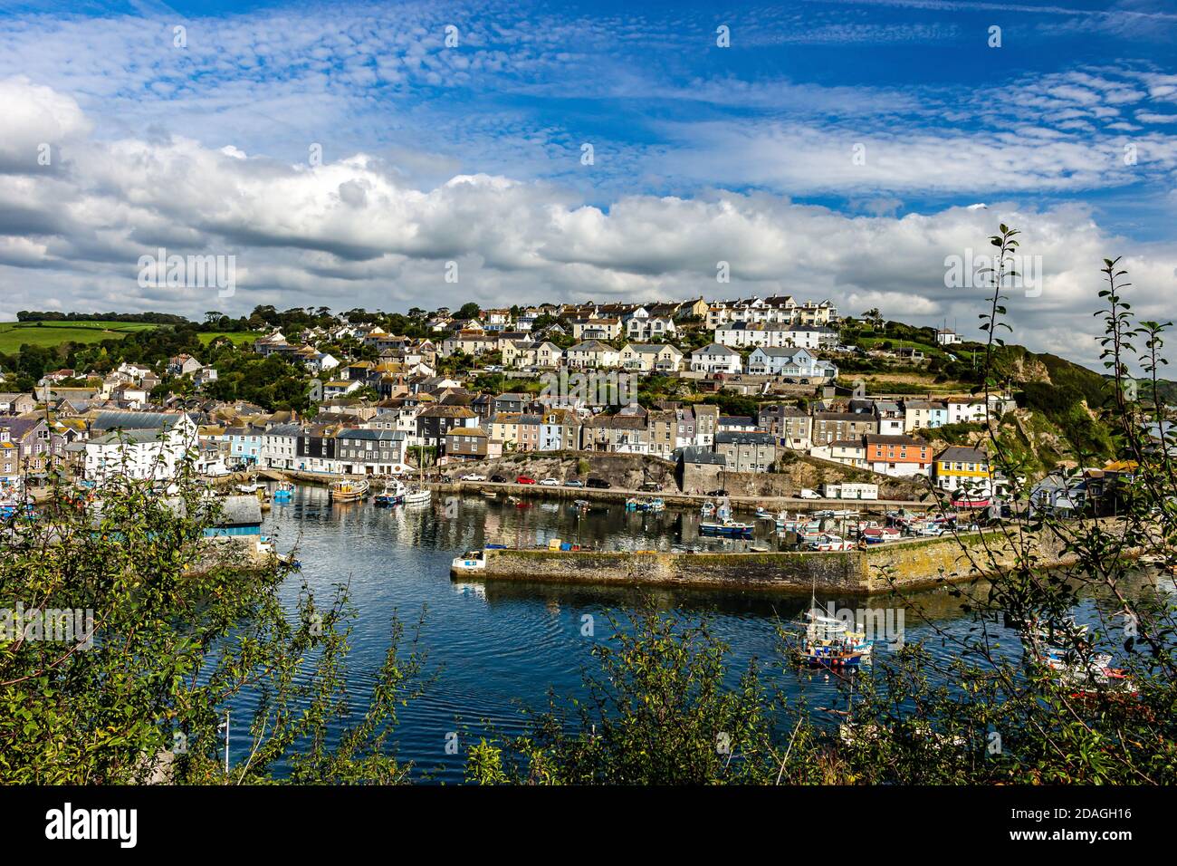 Sunny afternoon in old fishing village. Mevagissey in Cornwall. Memory of a wonderful holiday. Stock Photo