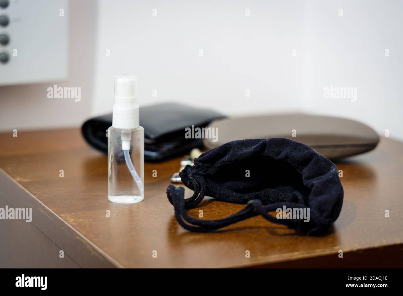 Pandemic setup ready before leaving home: face mask and disinfectant in ...