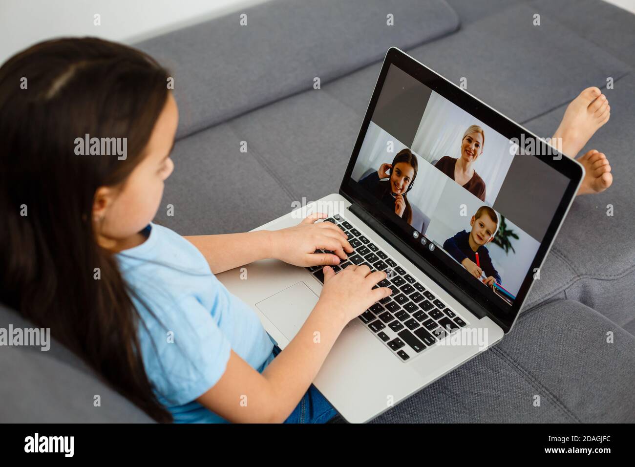 Cute little girl using laptop at home. Education, online study, home ...