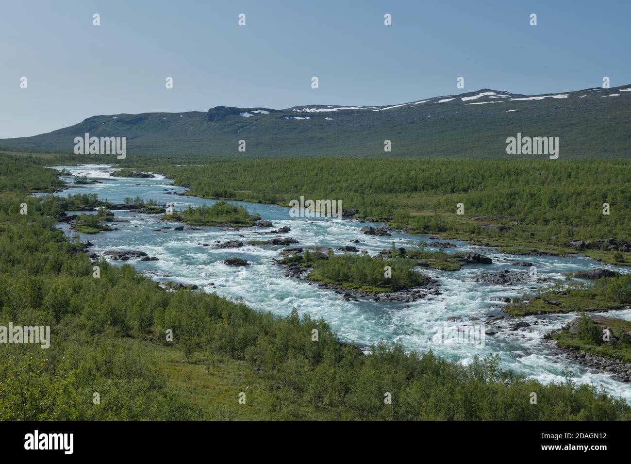 Flowing water of Vuojatädno river along Padjelantaleden Trail, Lapland, Sweden Stock Photo
