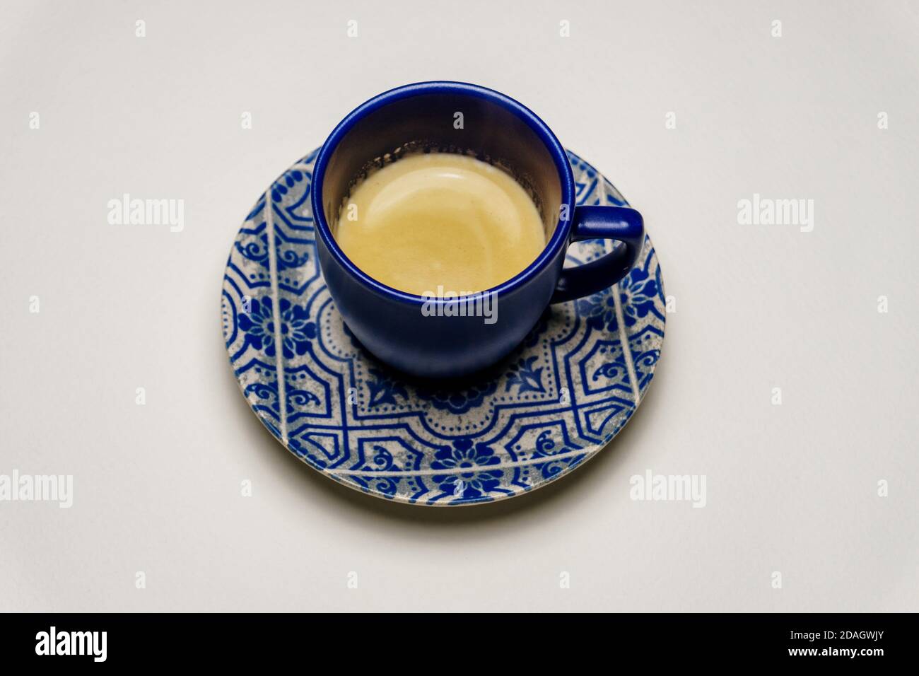 Espresso coffee in a blue espresso cup Stock Photo