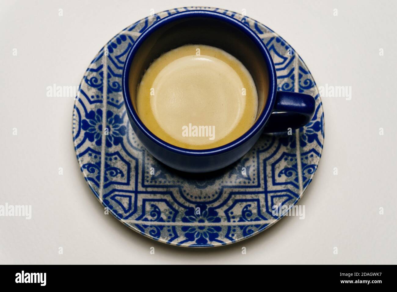 Espresso coffee in a blue espresso cup Stock Photo