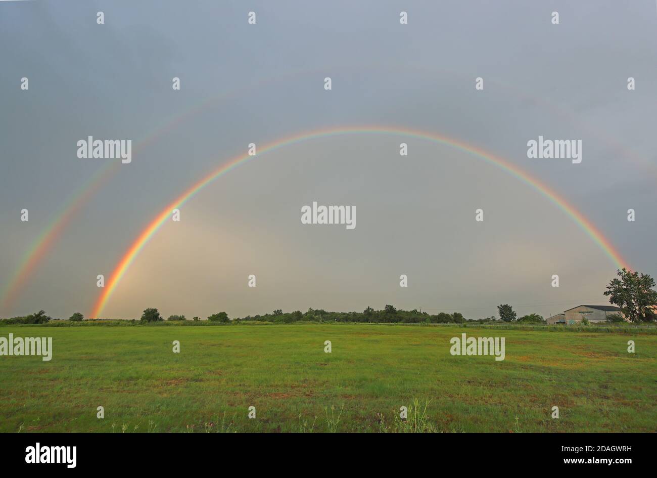 rainbow over Pannonian Steppe, Hungary, Hajdu-Bihar, Hortobagy National Park Stock Photo