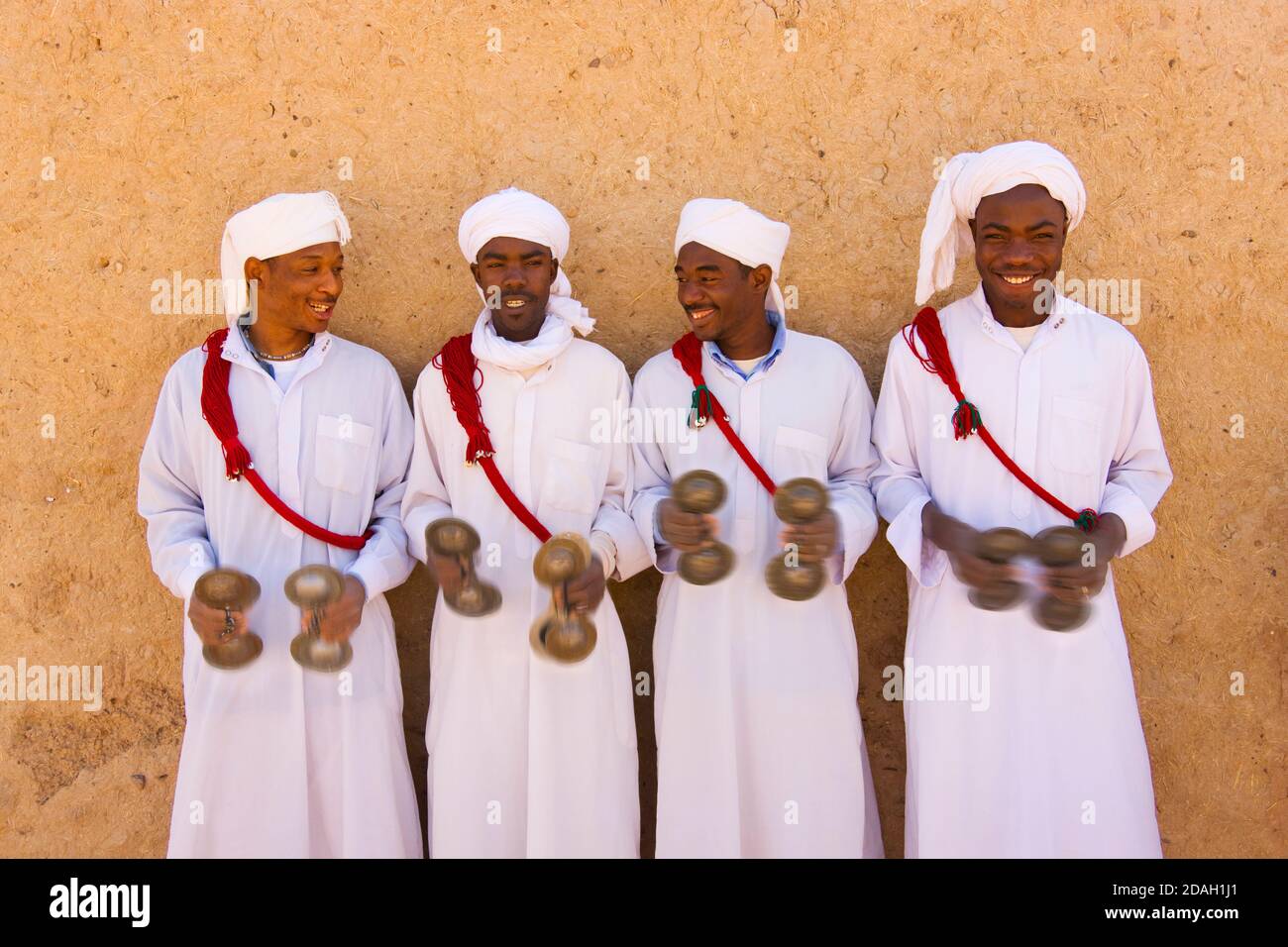 Musicians in Sahara Desert, Erg Chebbi, Morocco Stock Photo