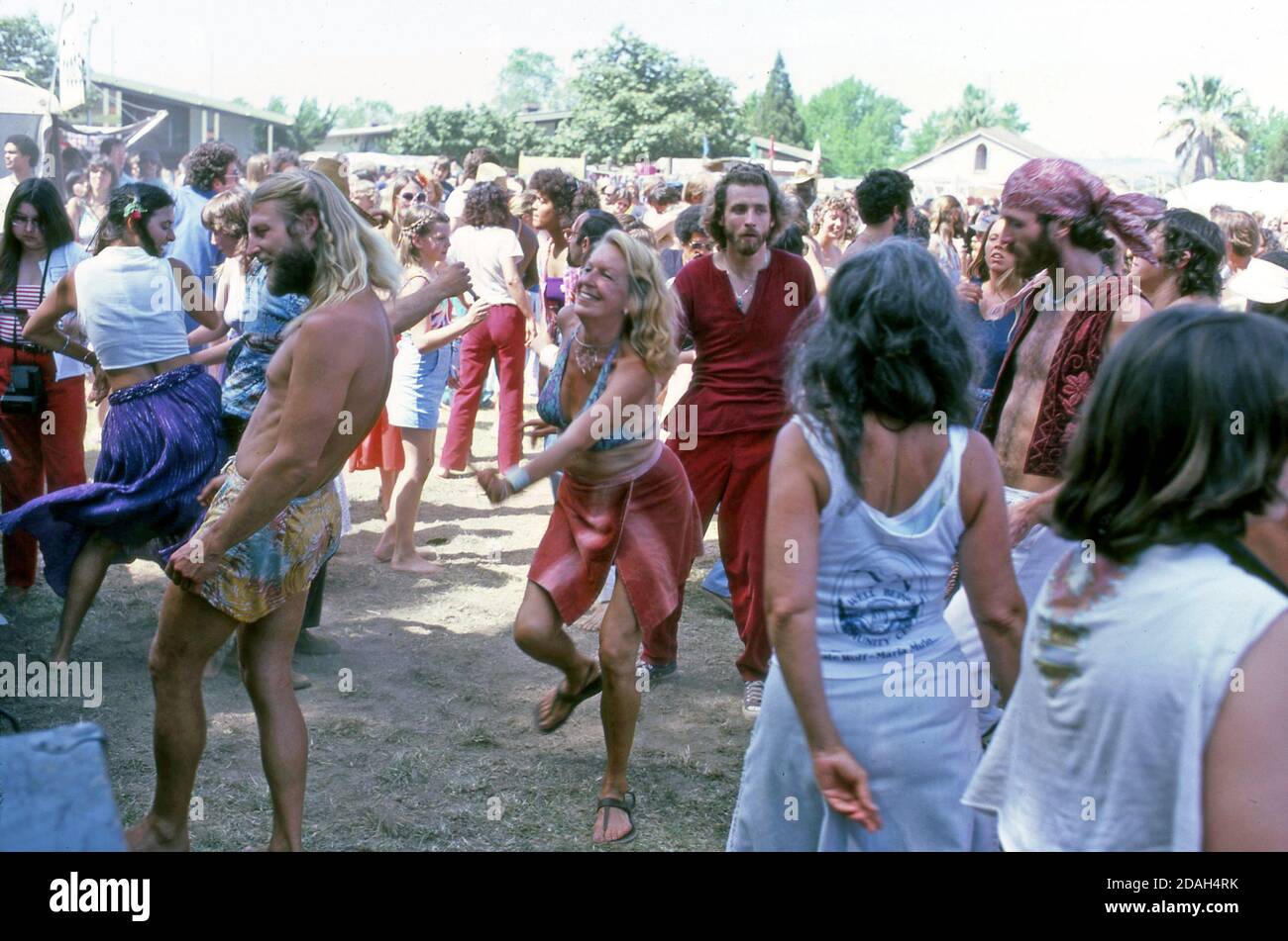 Hippies dancing at festival in Santa Rosa, CA circa 1970s Stock Photo