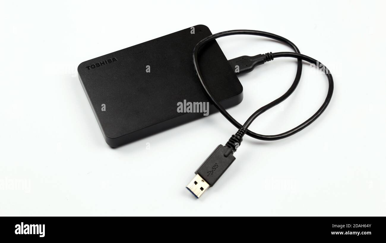 Toshiba 1 terabyte external hard drive black color isolated on white background. Selective focus Stock Photo