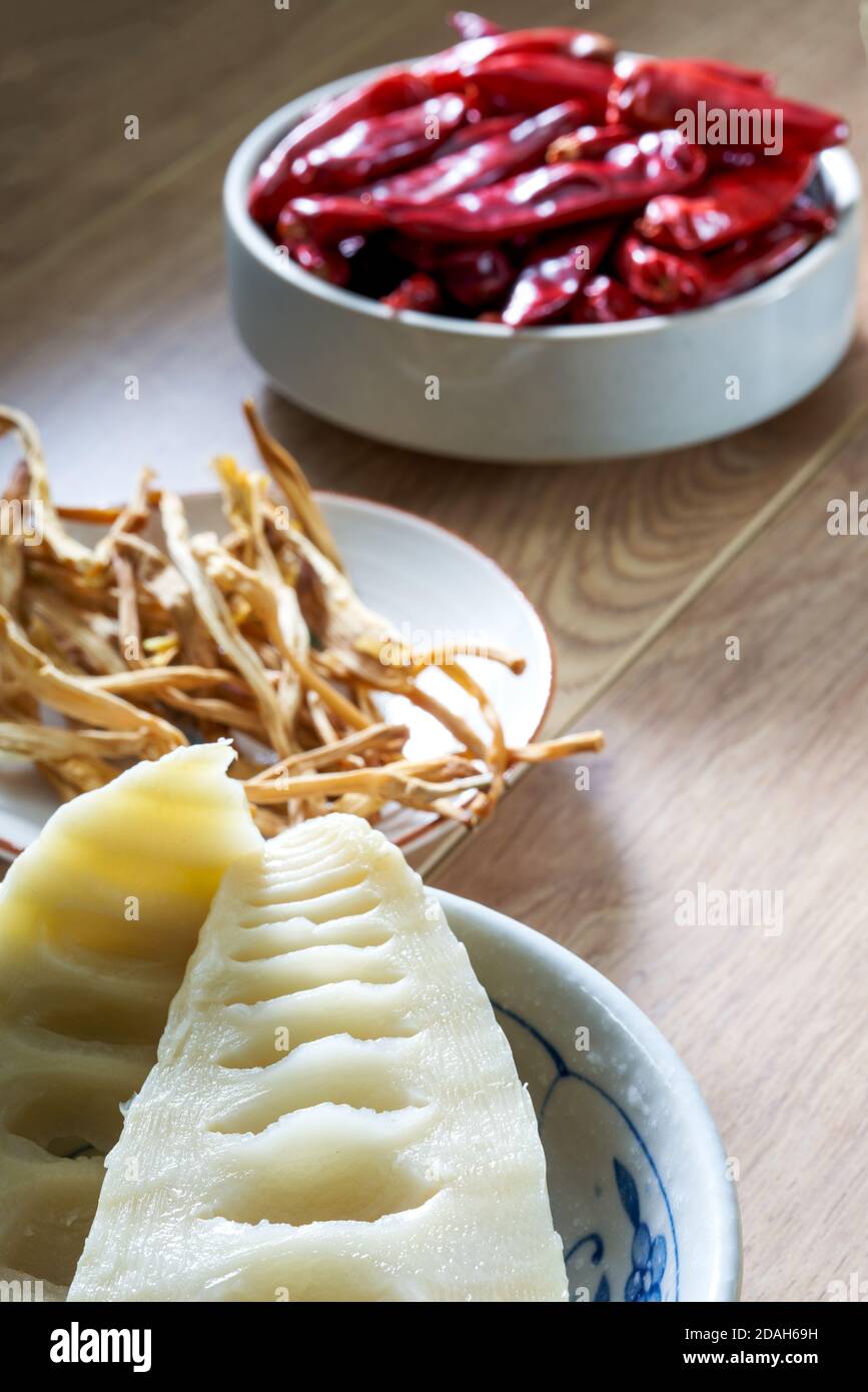 A bowl of sour bamboo shoots cross section noodles and dried day lily