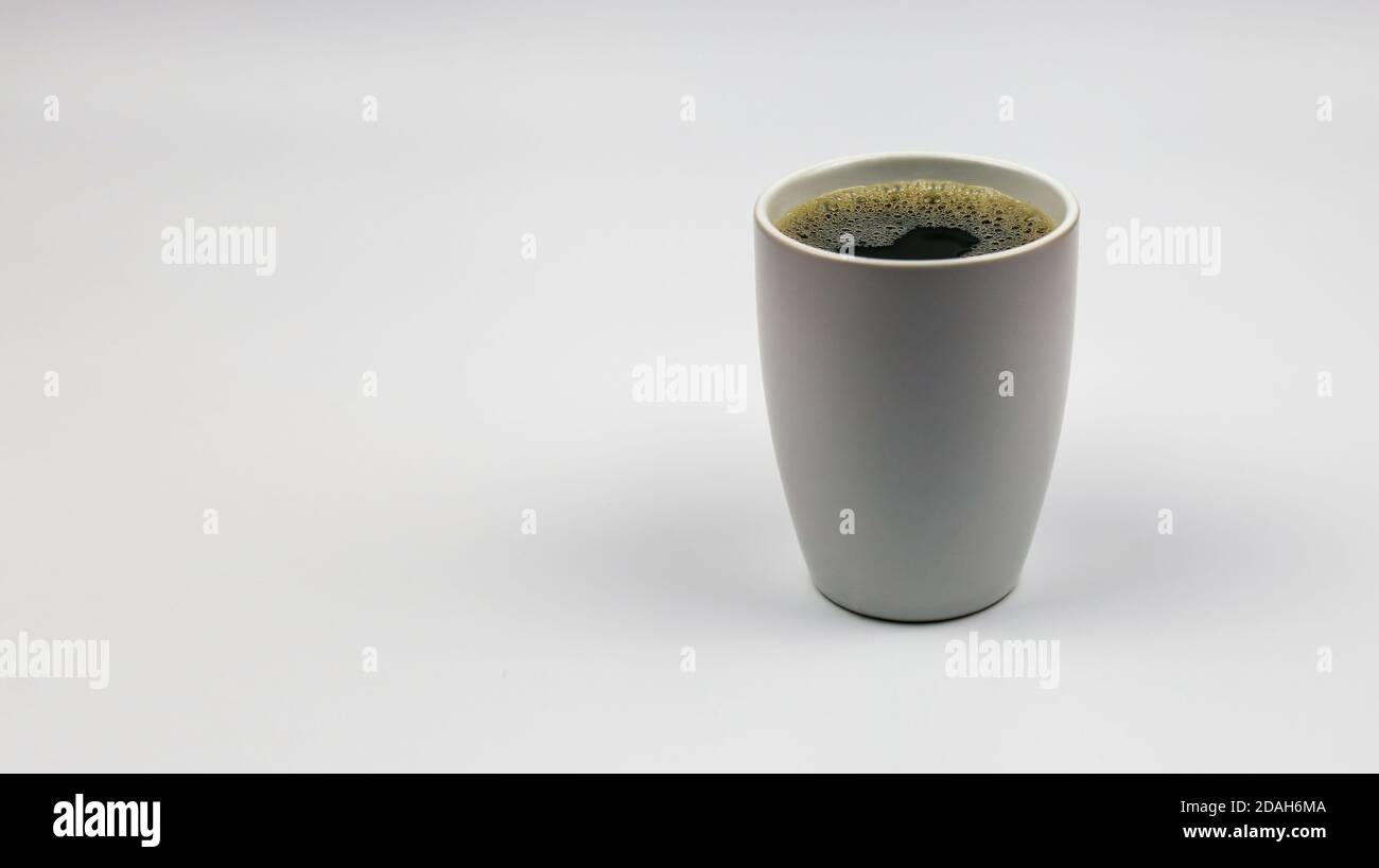 Close up black hot coffee white mug with white background. Refreshing concept Stock Photo