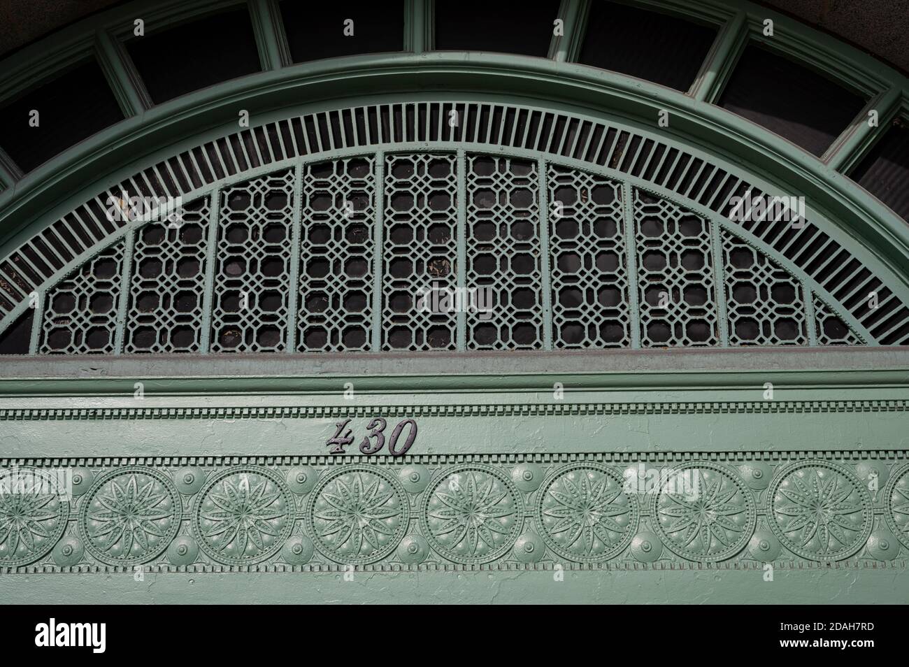 copper patina above entry door in Chicago Stock Photo