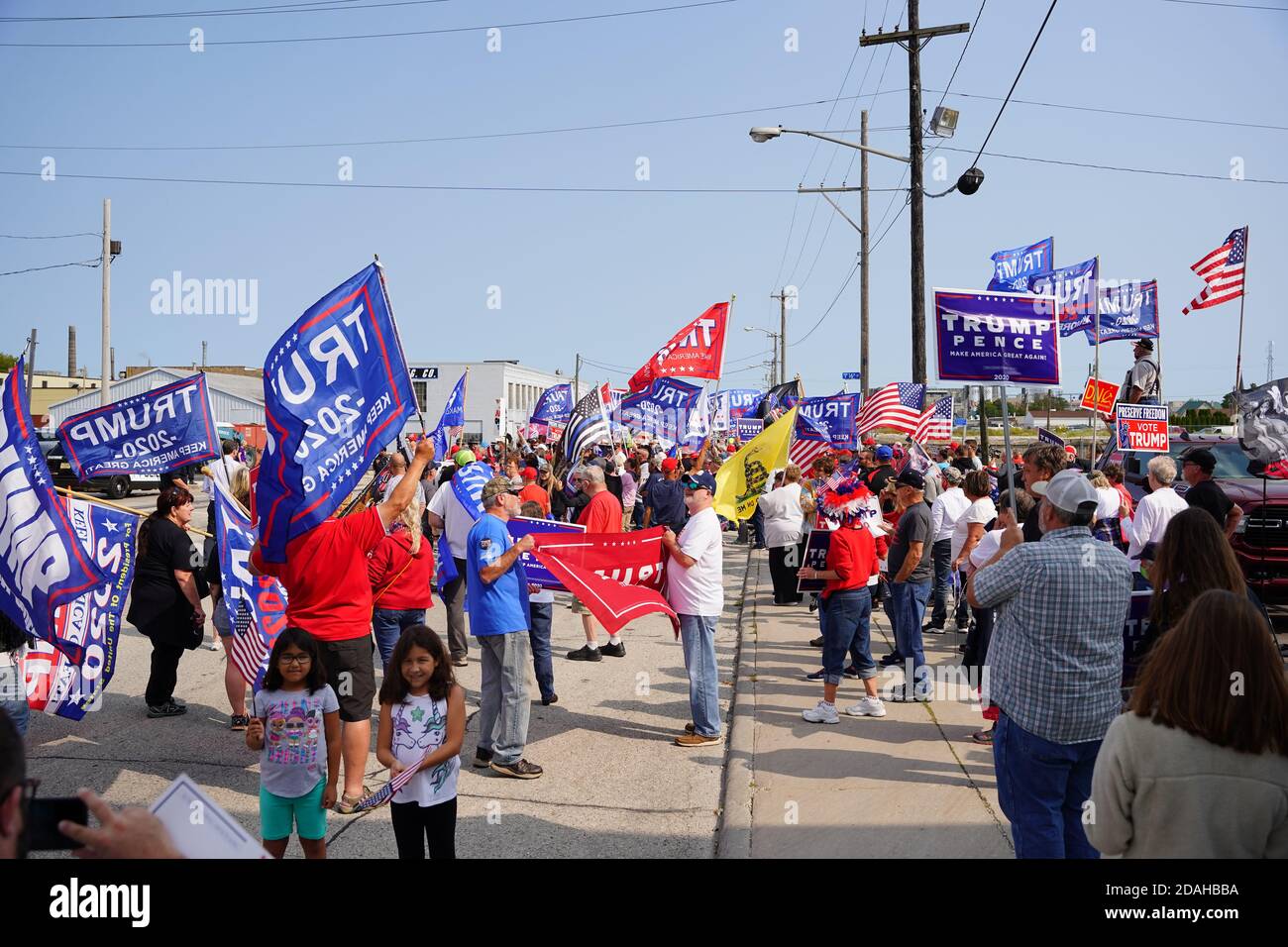 President trump and vice president mike pence supporters and joe biden and kamala harris supporters rallied together outside aluminum foundry. Stock Photo