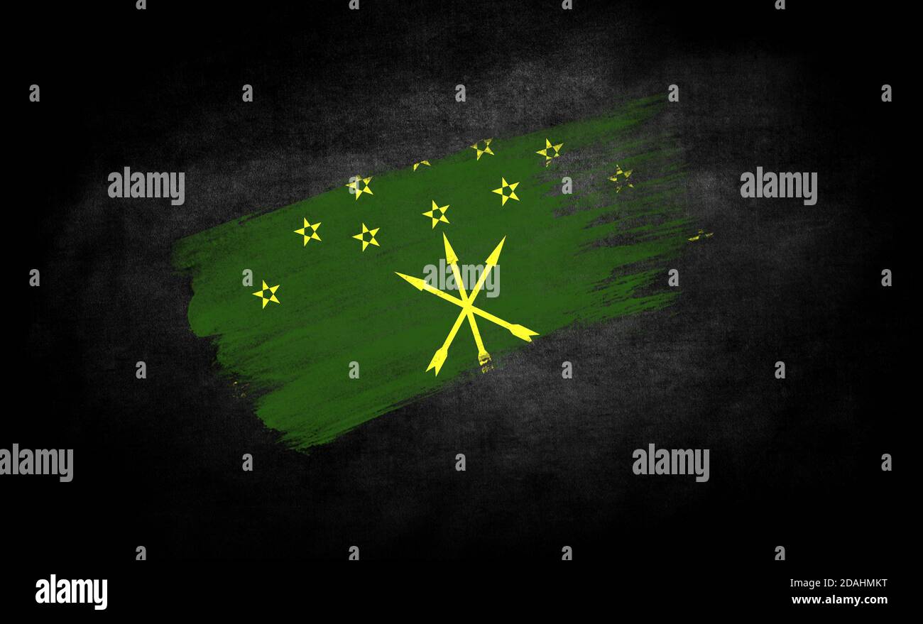 smear of paint in the form of the flag of Adygea close-up on a black background Stock Photo